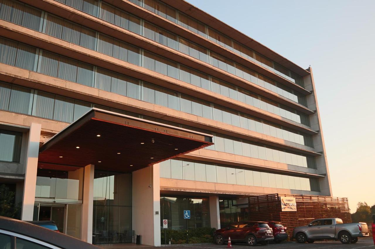 Wyndham Concepcion Pettra Hotel Kültér fotó The hotel's entrance