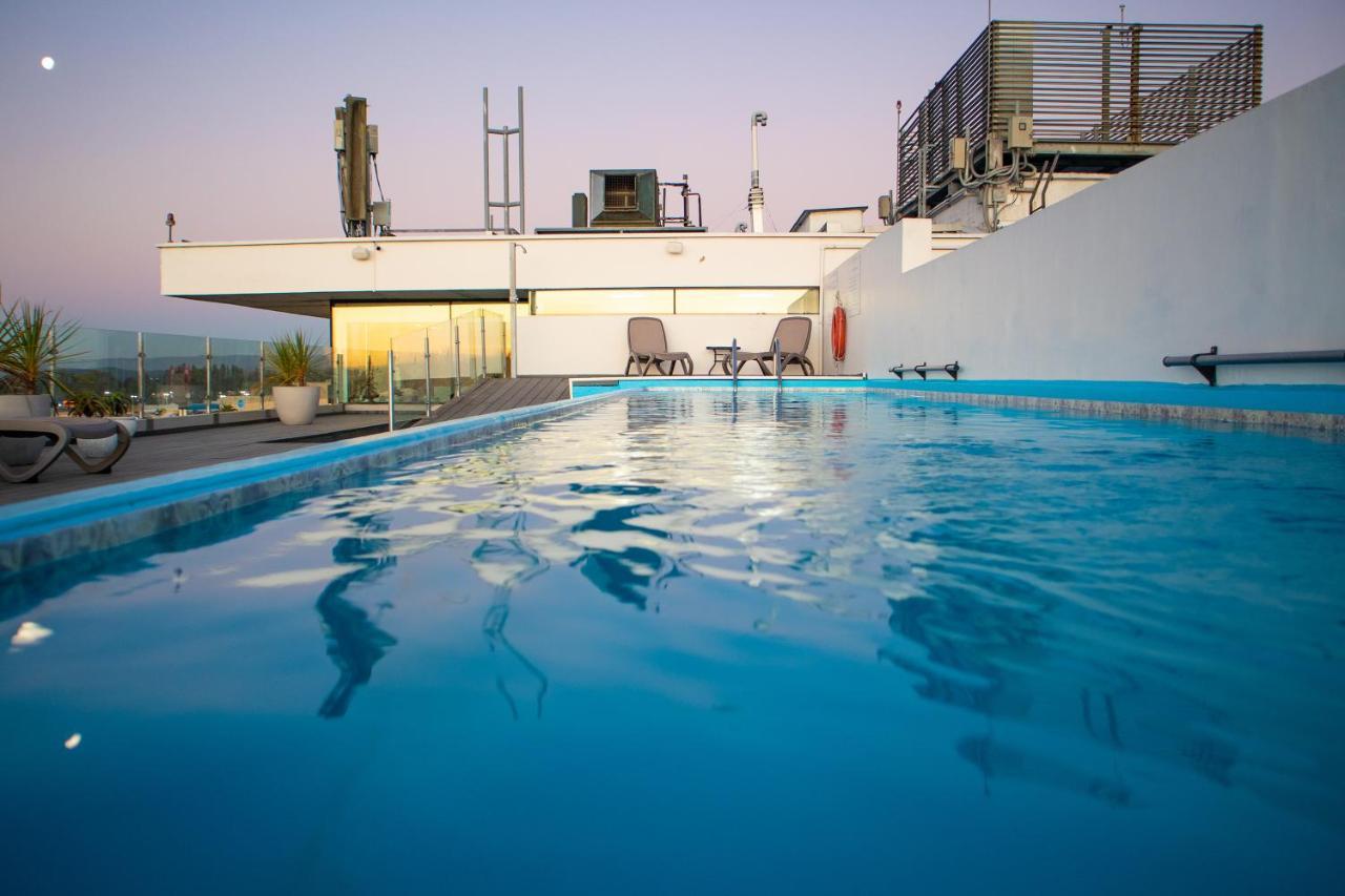 Wyndham Concepcion Pettra Hotel Kültér fotó Rooftop pool