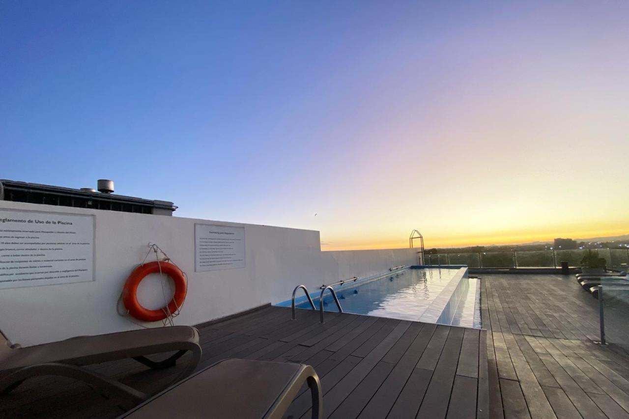 Wyndham Concepcion Pettra Hotel Kültér fotó Rooftop pool at the hotel