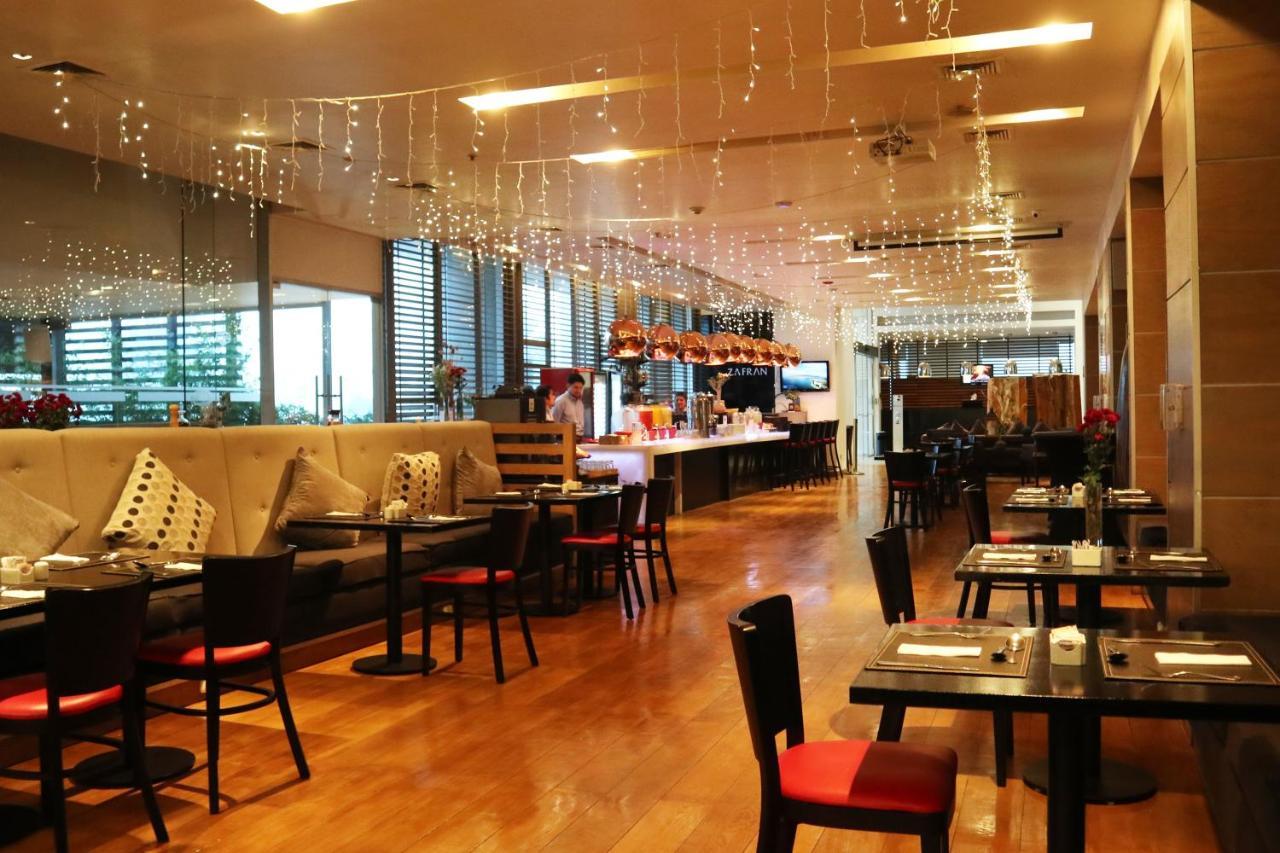 Wyndham Concepcion Pettra Hotel Kültér fotó The interior of the restaurant