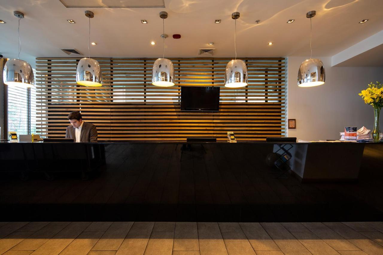 Wyndham Concepcion Pettra Hotel Kültér fotó Reception desk at the hotel